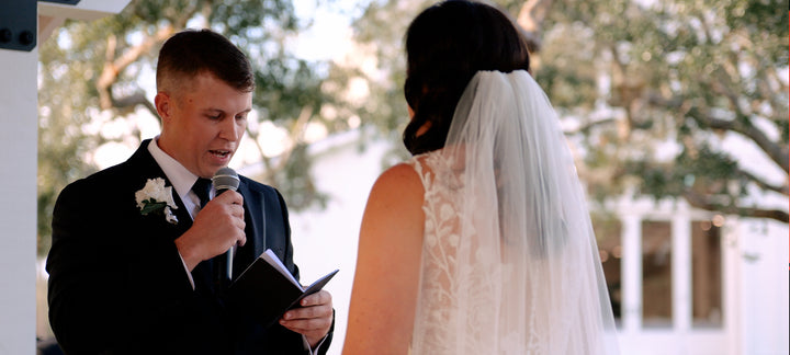 groom giving vows at ceremony